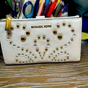 Michael Kors’s wallet/wristlet, white with gold detail